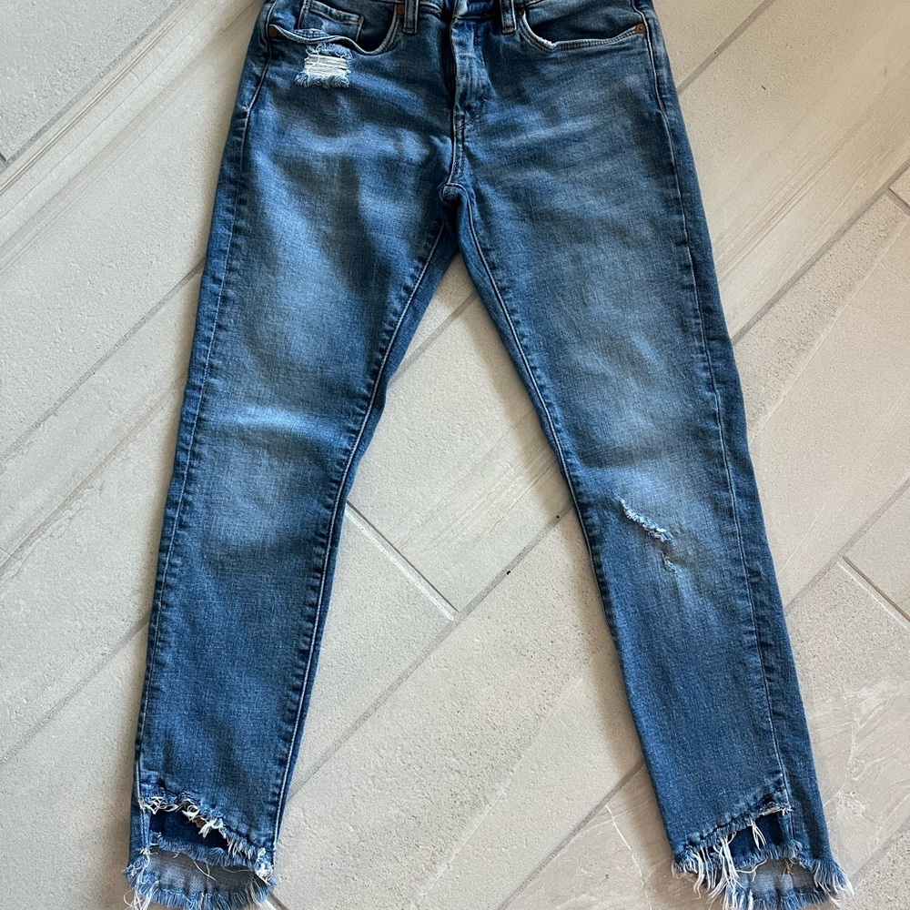 Women's Distressed Blue Jeans